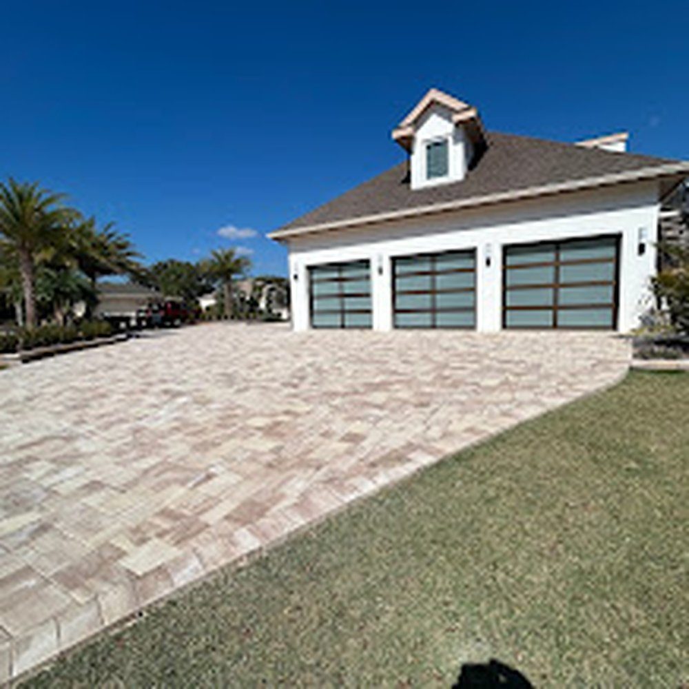 Expansive paver driveway installed by Marblu at a Florida residence